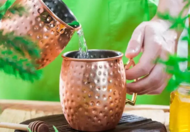 drinking water from a lota